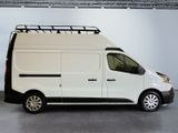 the white van is parked in the garage with its roof rack on