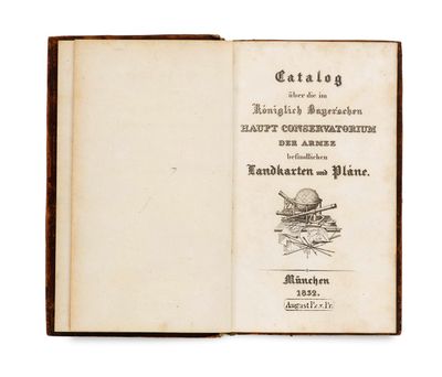 an open book with a drawing of a snail on it