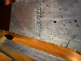 a close up of a piece of metal on a table
