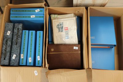 a box full of books sitting on top of a table