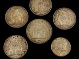 six gold sovereigns of the british empire