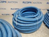 several blue hoses sitting on top of a table next to each other