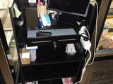 a desk with a laptop and a monitor on it
