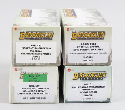 trois paquets de cigarettes « Brooklyn » sont empilés les uns sur les autres