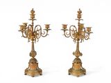 pair of antique brass candelabs with candlesticks on stands