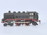 a toy train that is sitting on a white surface