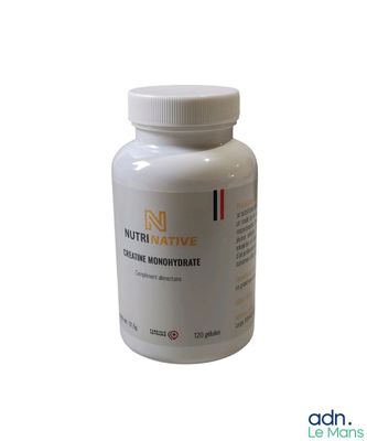 the bottle of nutri active is sitting on a white surface