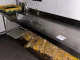 an image of a kitchen with a sink and a counter