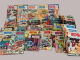 a lot of comic books that are on the table