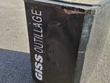 a black box sitting in the middle of a parking lot