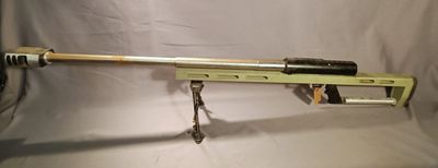 an image of a rifle with a long barrel on a white background