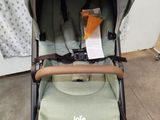 the baby stroller has a seat that is attached to the back of the stroller