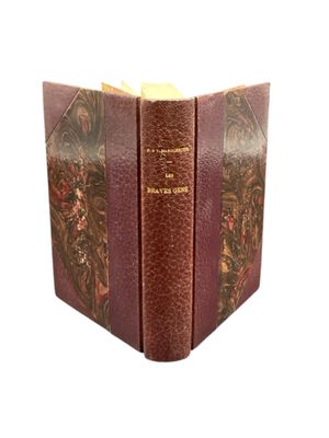 a book that is open on a white surface