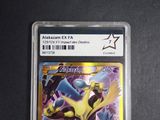 a close up of a pokemon card on a table