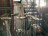 a lot of chairs that are sitting in a room