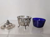 a blue glass bowl and a blue glass bowl on a table