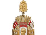 gros plan d'une médaille sur fond blanc