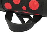 black and red polka dot leather handbag with red polka dots on it