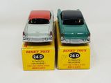three toy cars that are sitting on top of each other