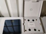 a tablet in the box with the lid open