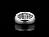 an image of a diamond ring on a black surface