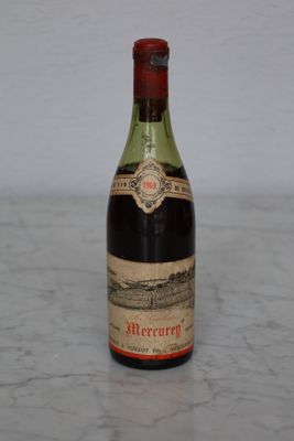 a bottle of wine that is sitting on a table