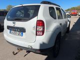 a white car that is parked in a parking lot