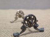 a small metal object that is on a table