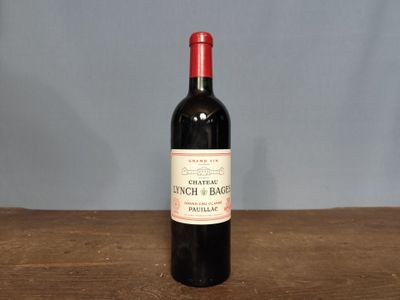 a bottle of wine that is sitting on a table