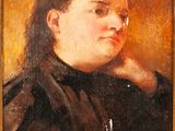 une peinture à l'huile représentant une femme en robe noire, la main posée sur le menton