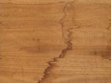 an image of a piece of wood with a piece of paper on it