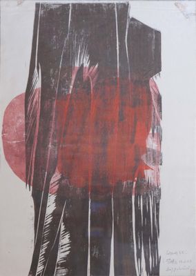 une image représentant un cercle rouge sur un fond noir et blanc
