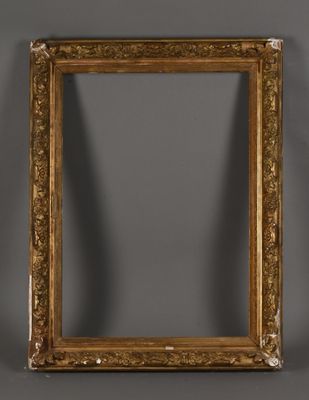 Cadre en bois et stuc doré à décor de frises de feuillages e…