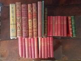 a lot of books that are sitting on a table