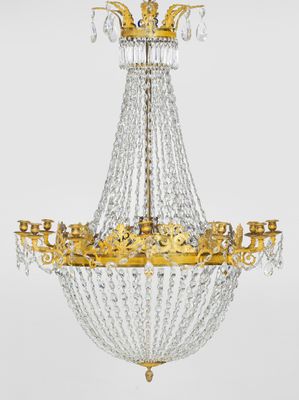 a gold and crystal chandelier hanging from a ceiling