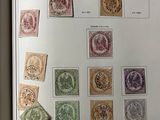 a book with a bunch of different stamps on it