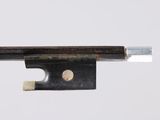 a close up of a violin bow on a white background