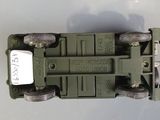 a toy army vehicle that is sitting on a table