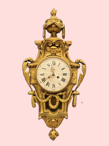Cartel d’applique en bronze doré style Louis XVI, XIXe. Mouvement