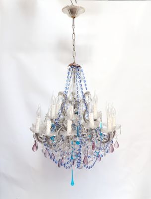 a chandelier that is hanging from a wire