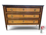 an image of a wooden chest of drawers with a marble top