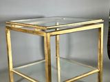 brass and glass side table with a glass top