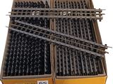 several boxes filled with lots of different kinds of screws