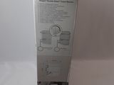 packaging for a nintendo wii system sitting on top of a white table