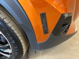a close up of a car ' s bumper with a sticker on it