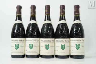 six bottles of wine are lined up in a row on a table