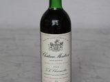 a bottle of wine that is sitting on a table