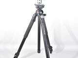 a tripod with a blue light on it on a white background