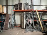 a lot of different types of metal items in a warehouse