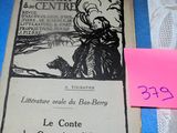 a book on a table with a pink post - it on it